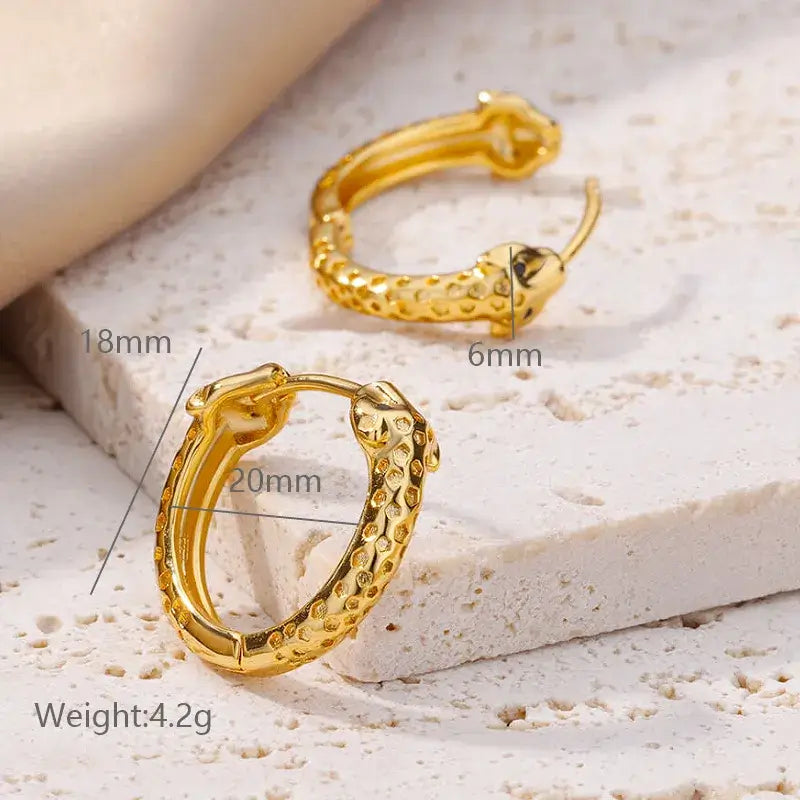Woman wearing minimalist gold-plated earrings for daily style
