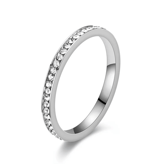 Stainless steel zircon inlay ring showcasing elegant design with sparkling zircon inlays for women's jewelry.