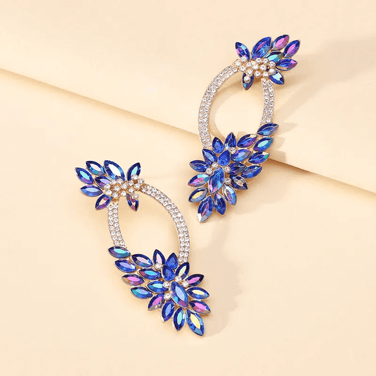 Shiny wreath petal drop earrings featuring a unique design with sparkling glass inlay and elegant blue tones.