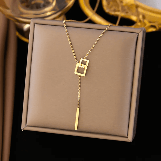 U-shape Heart Pendant Necklace – 18K Gold Plated displayed on a jewelry box showcasing its modern design.