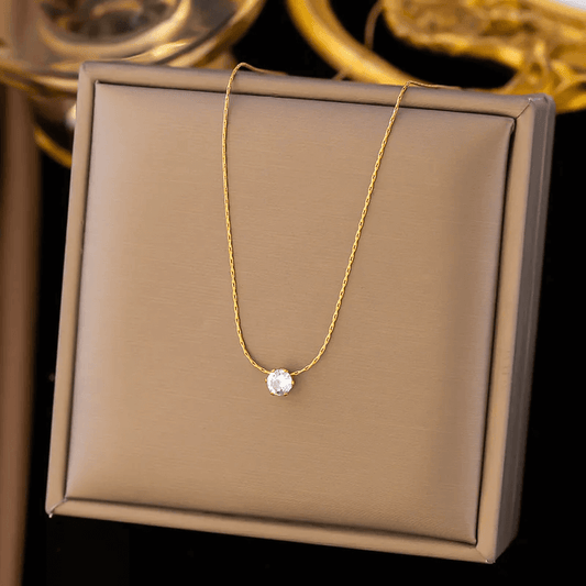 U-shape Heart Pendant Necklace – Gold Plated Stainless Steel displayed on a gift box with a sparkling rhinestone.