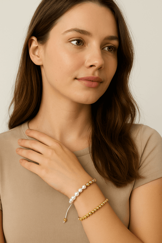 Women's knitted pearl bracelet close-up