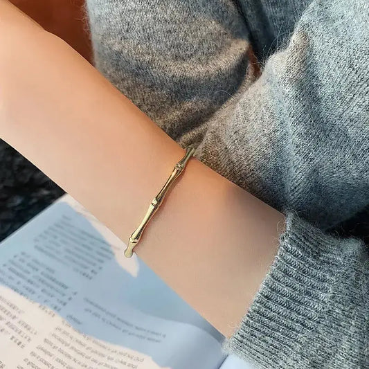 Close-up of Simple Style Round Alloy Bangle showing smooth plated finish