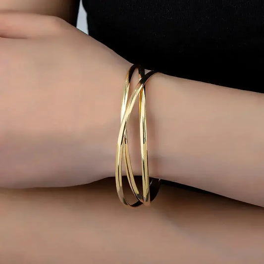 Woman wearing Simple Style Solid Color Iron Bangle stacked with other bracelets