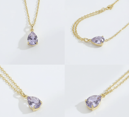 Vintage water drop pendant necklace showcasing a polished water drop design with lavender gemstone and gold chain.