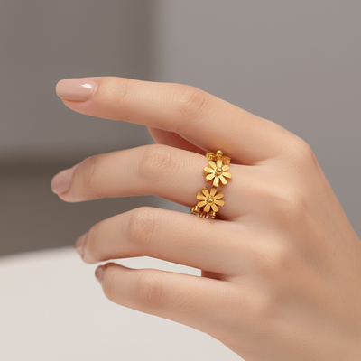 18K gold plated flower ring on a hand, showcasing its charming design and adjustable fit.