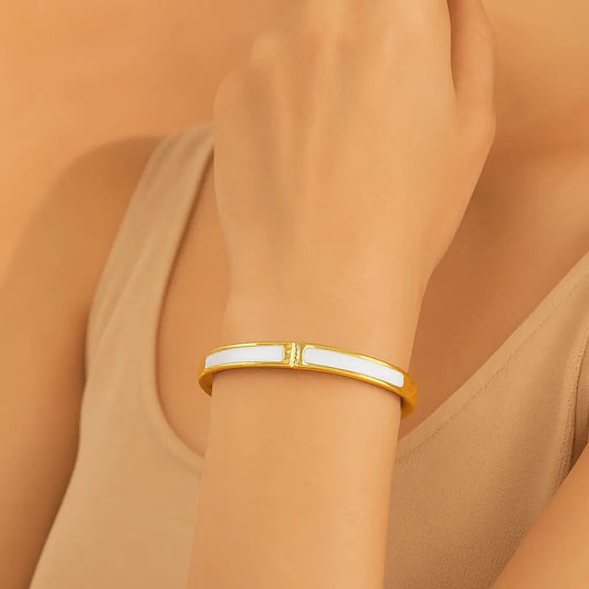 Woman wearing Classic Alloy Rhinestone Bangle stacked with other bracelets