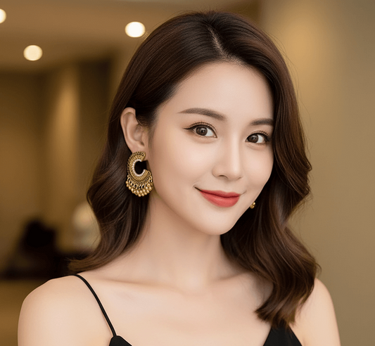 Woman wearing retro ethnic tassel earrings, showcasing stylish boho statement jewelry.