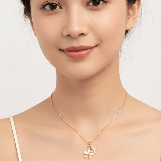 Romantic Gold Necklace – 18K Gold Plated Heart Pendant for Women worn by a woman, showcasing a floral design.