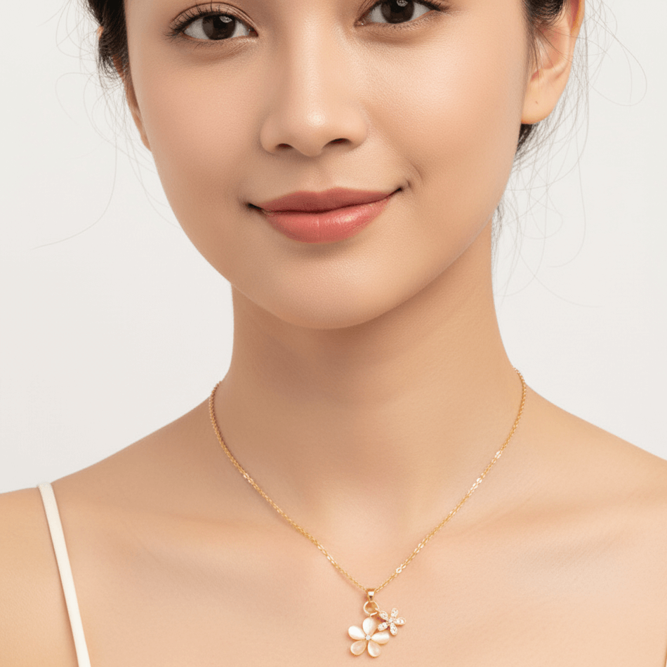 Romantic Gold Necklace – 18K Gold Plated Heart Pendant for Women worn by a woman, showcasing a floral design.