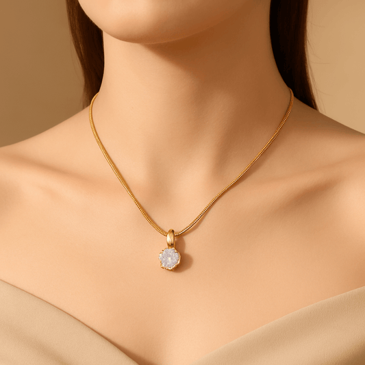 Close-up of zircon gold-plated necklace showing sparkling zircon inlay