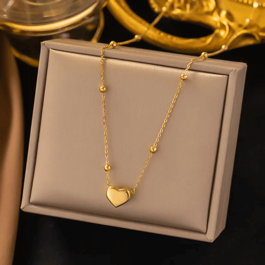 stainless steel gold necklace heart-shaped pendant close-up