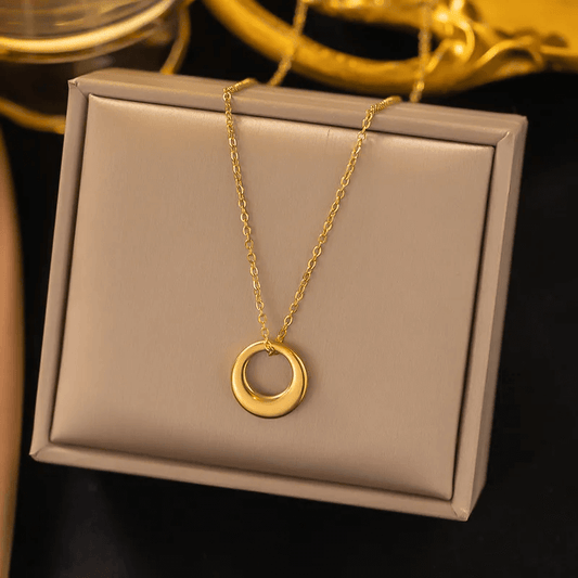 18K gold-plated pendant necklace displayed on a stylish gift box, showcasing elegant jewelry design.
