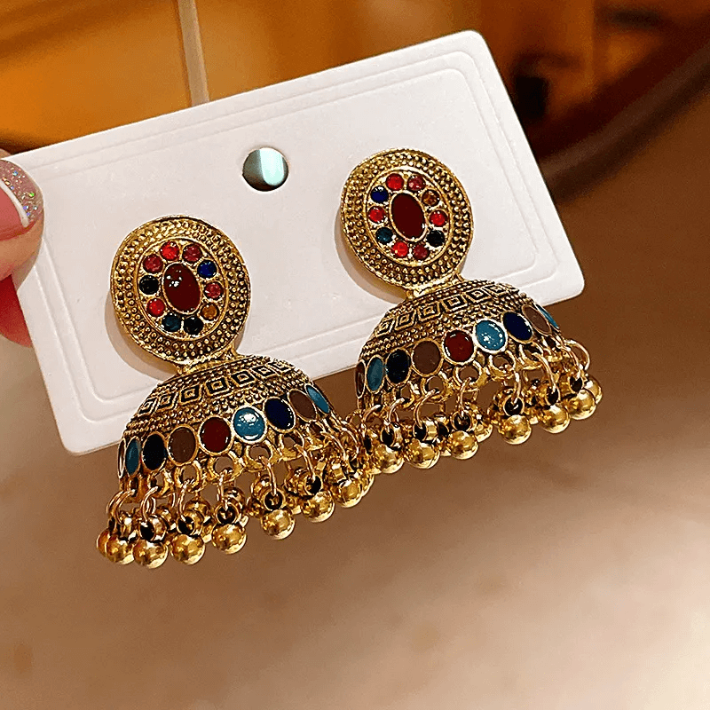 Retro water drop tassel earrings with colorful gemstones and gold accents on a display card.