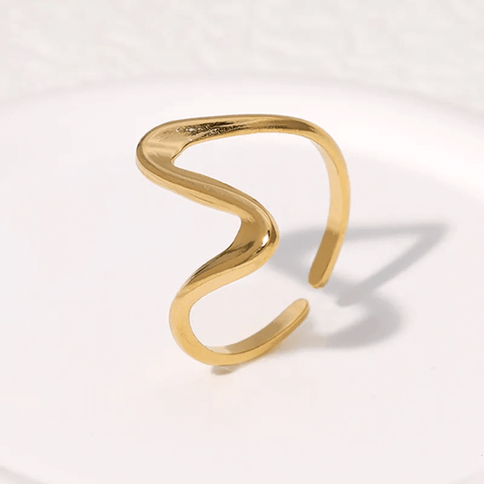 Gold plated geometric ring for women showcasing trendy and chic design with a hollow-out geometric pattern.