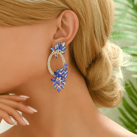 Shiny wreath petal drop earrings worn by a model with elegant hairstyle and graceful pose.