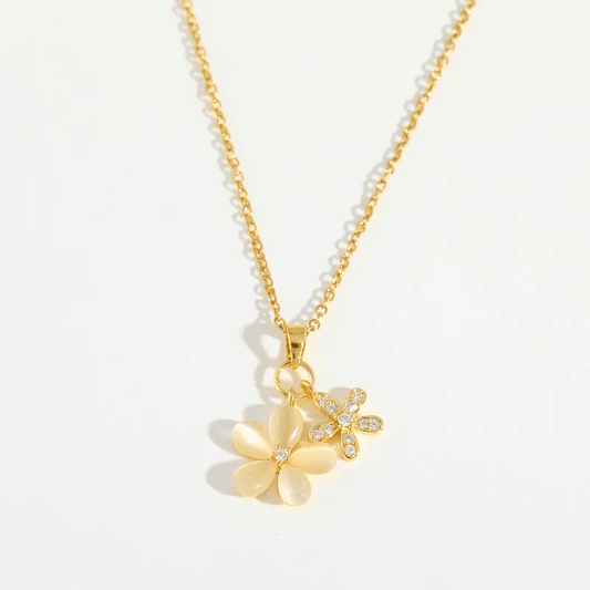 Romantic Gold Necklace – 18K Gold Plated Heart Pendant for Women featuring gold floral charms with zircon accents.
