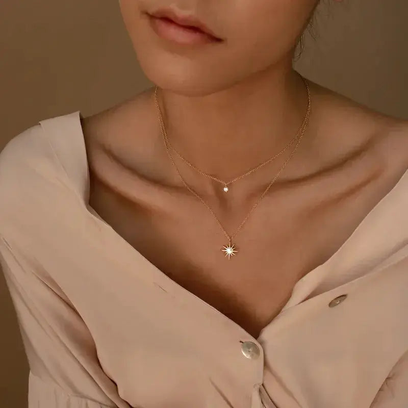 Close-up of Star Layered Necklace with glass and zircon accents