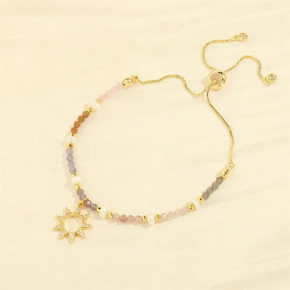 Bohemian gold sun bracelet close-up