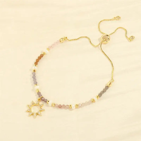 Bohemian gold sun bracelet close-up