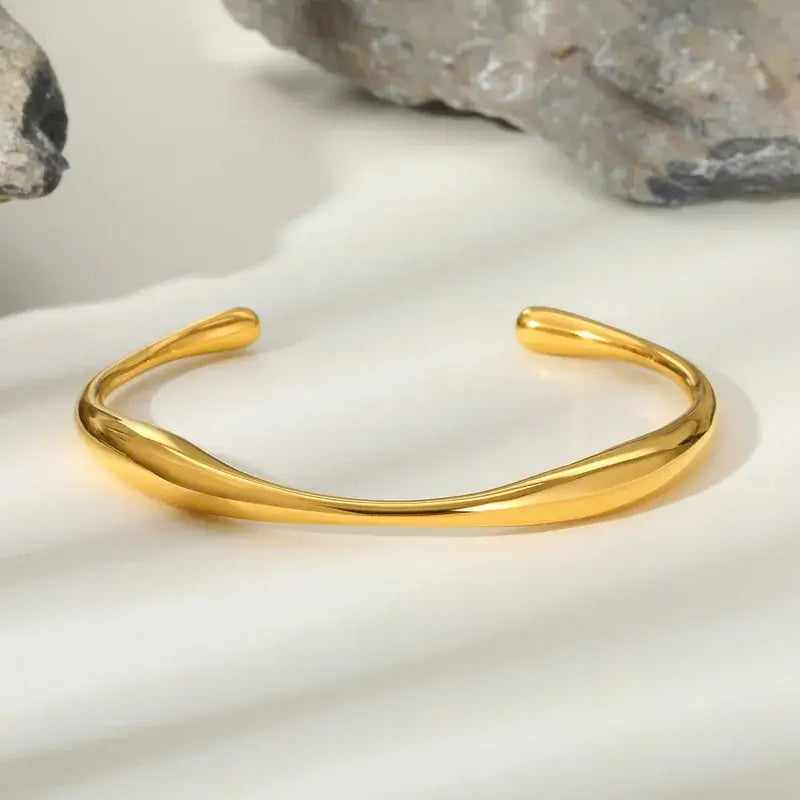 Gold-plated classic bangle in elegant jewelry box packaging