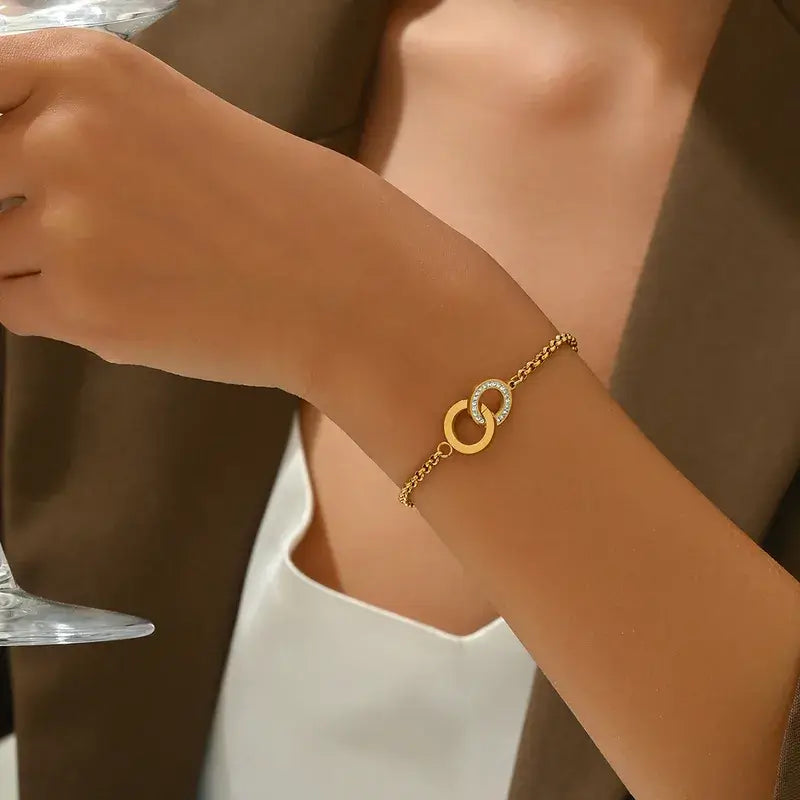 Close-up of 14K gold plated rhinestone bracelet on model