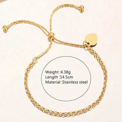 Classic 18K gold plated heart bracelet styled on model