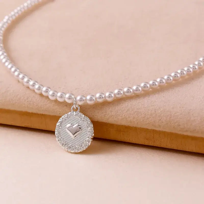 Freshwater pearl pendant necklace with beaded chain and round copper pendant
