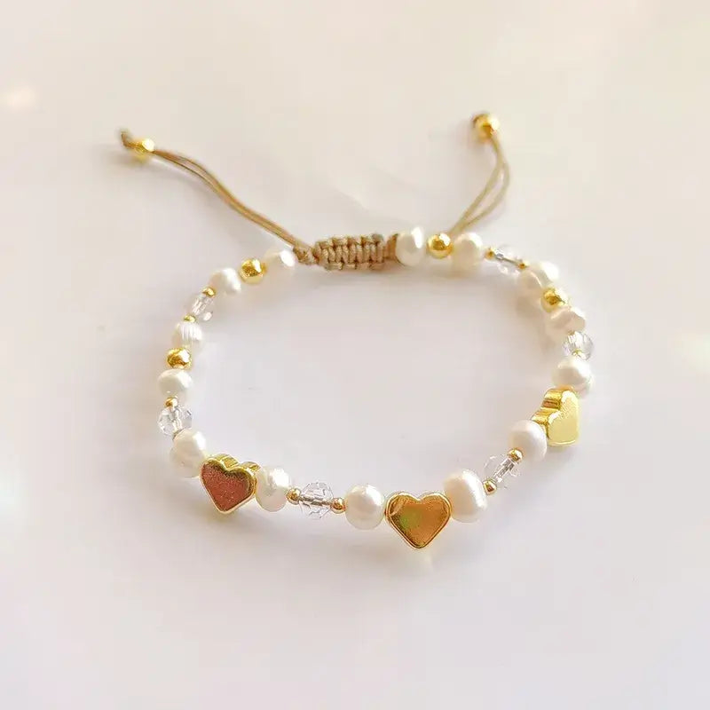 Heart charm bracelet with faux pearls and clay beads