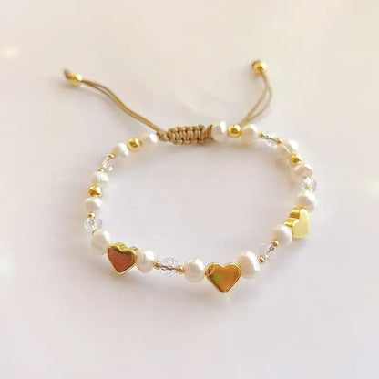 Heart charm bracelet with faux pearls and clay beads