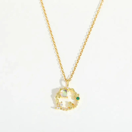 alt="18K gold plated zircon pendant necklace with sparkling stones