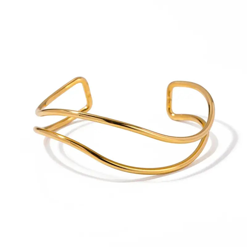 Gold-plated sea wave bangle paired with chic casual outfit