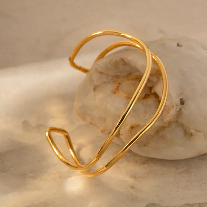 Gold-plated sea wave bangle in elegant jewelry box packaging