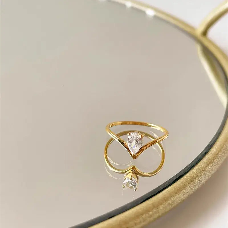 Minimal zircon titanium ring styled with casual or office outfit