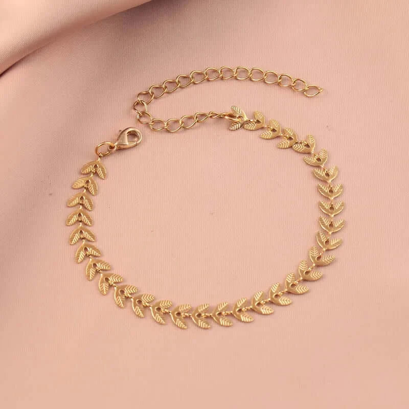 Gold-plated leaf bracelet with delicate 18K gold design