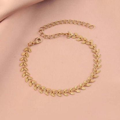Gold-plated leaf bracelet with delicate 18K gold design