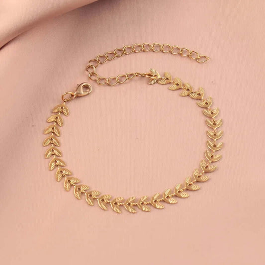 Gold-plated leaf bracelet with delicate 18K gold design