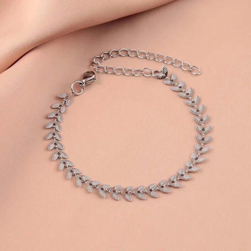 Gold-plated leaf bracelet in elegant jewelry box packaging