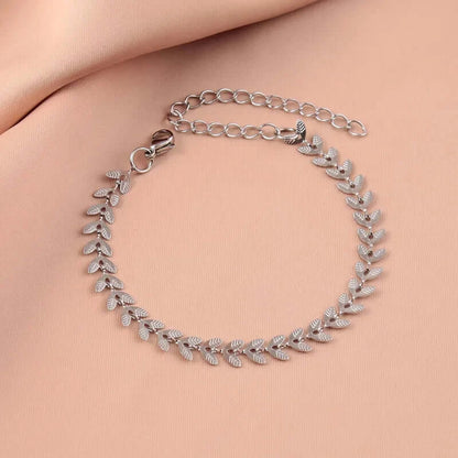 Gold-plated leaf bracelet in elegant jewelry box packaging