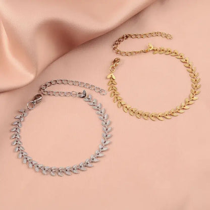 Close-up of gold-plated leaf bracelet clasp and stainless steel material