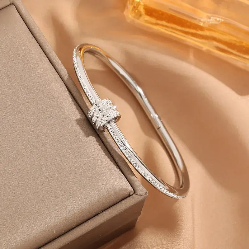Elegant Simple Round Titanium Steel Bangle styled for casual outfits