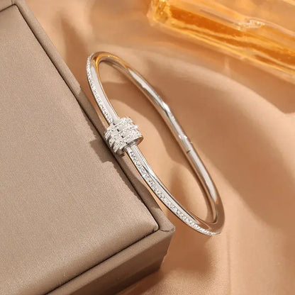 Elegant Simple Round Titanium Steel Bangle styled for casual outfits