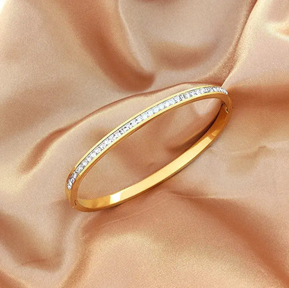 Titanium Steel Inlay Zircon Bangle on a white background