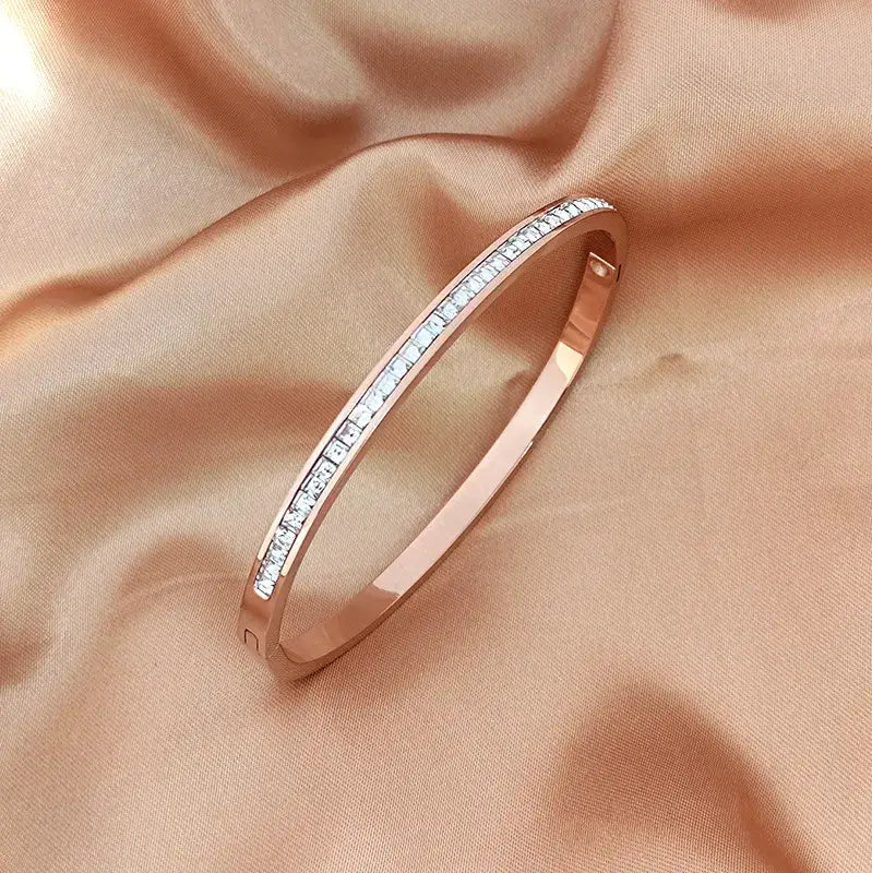 Side view of Titanium Steel Inlay Zircon Bangle highlighting smooth finish
