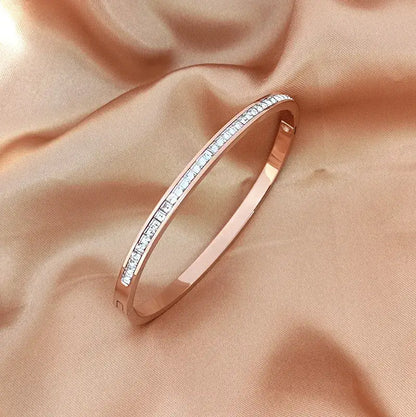 Side view of Titanium Steel Inlay Zircon Bangle highlighting smooth finish