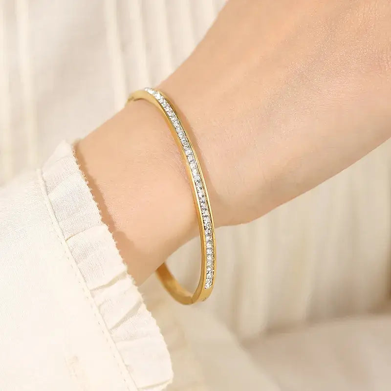 Close-up of Titanium Steel Inlay Zircon Bangle showing zircon inlays