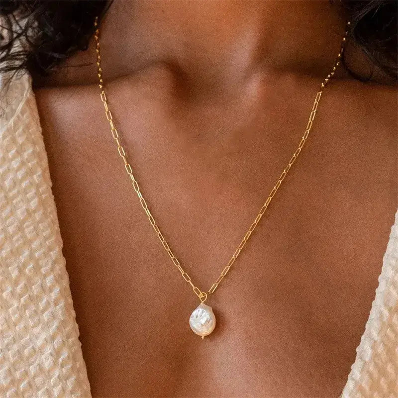 Freshwater pearl water droplet necklace worn by model