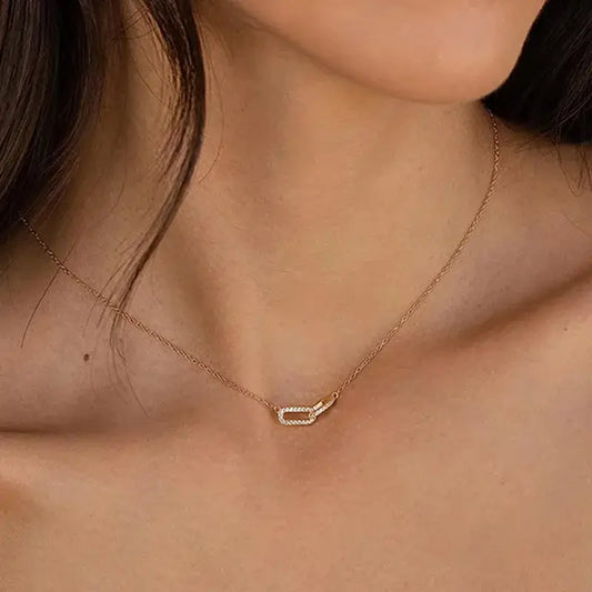 Close-up of oval zircon necklace pendant