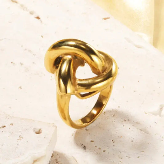 vintage geometric gold plated ring on hand – women’s jewelry