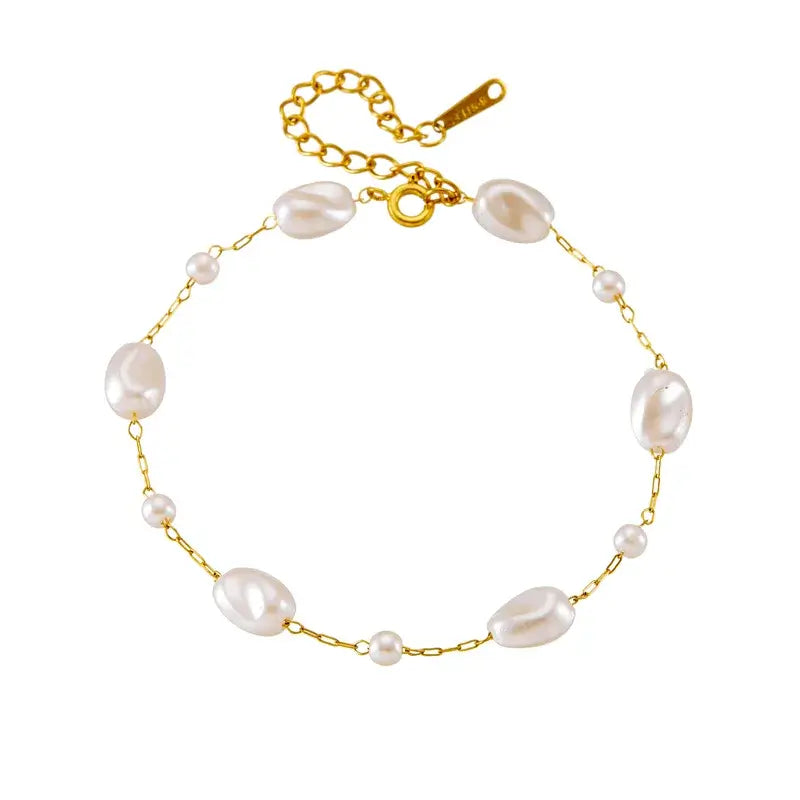 Close-up of stainless steel pearl bracelet showing pearl details